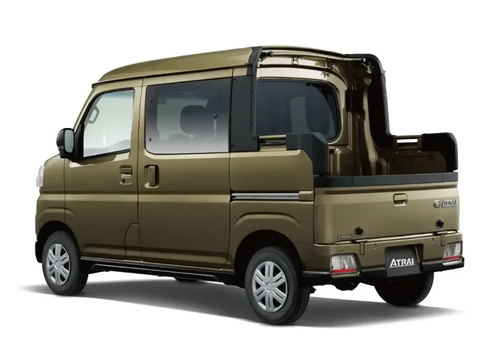 Daihatsu Atrai Deck Van in olive green, rear side view showing the unique four-seat cabin combined with open cargo bed layout for a kei truck alternative.