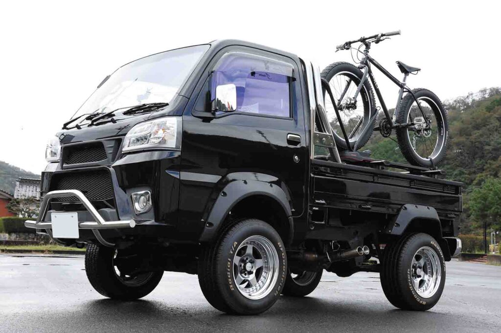 Black Hijet Truck configured for outdoor lifestyle with mountain bike rack